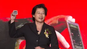 AMD CEO Lisa Su holding a processor onstage following the Ryzen 7 5800X3D Socket AM4 revival