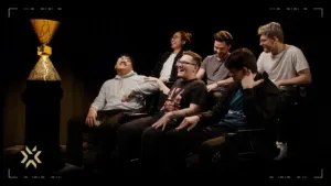 Evil Geniuses players gathered next to the VALORANT Champions trophy