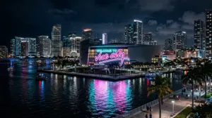 Welcome to Vice City neon sign glowing on the Kaseya Center arena roof in Miami